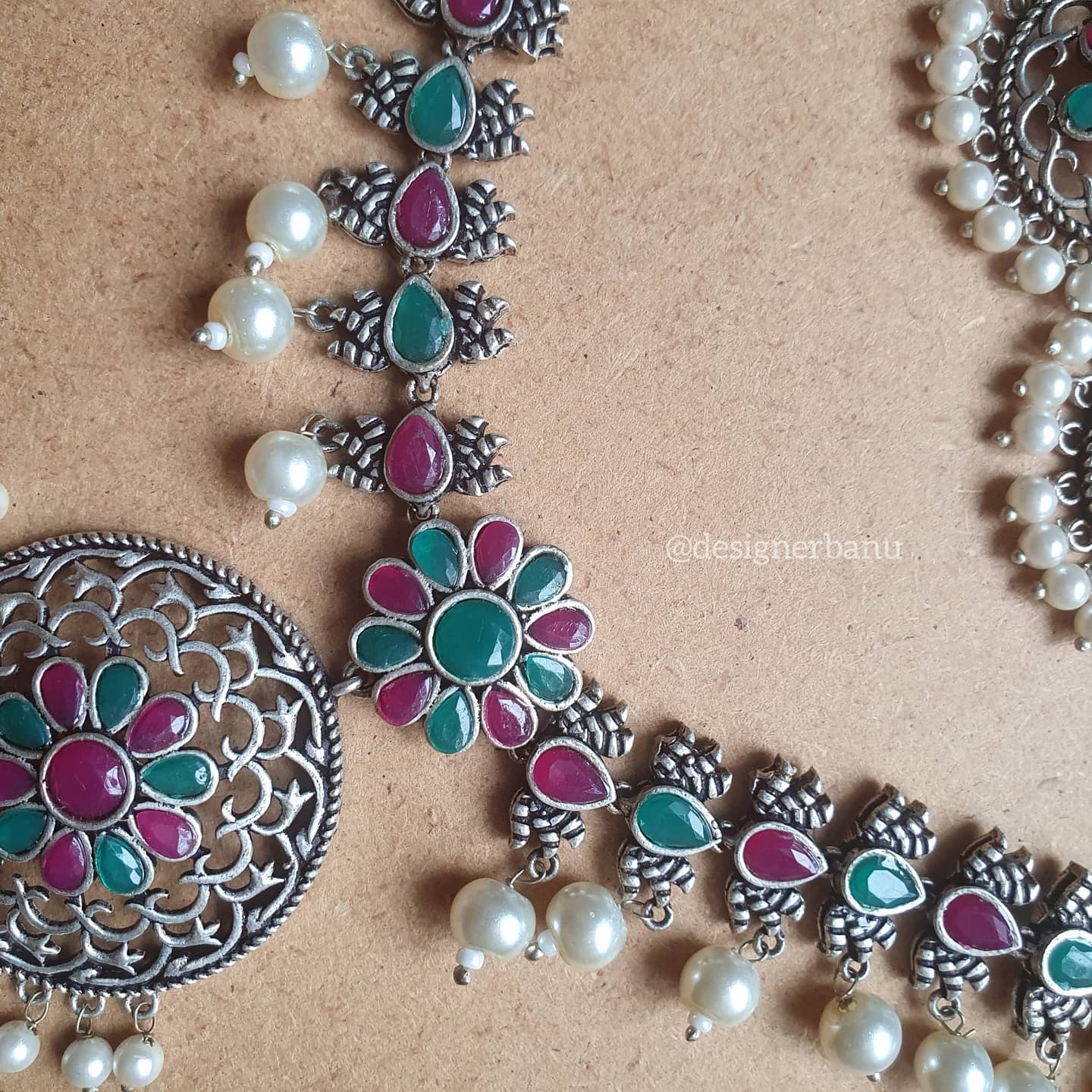 Silver Oxidized temple stone necklace with matching earrings.