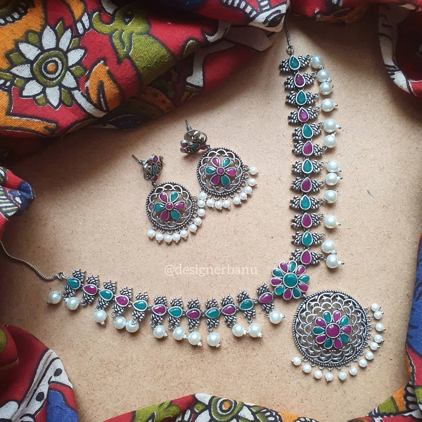 Silver Oxidized temple stone necklace with matching earrings.