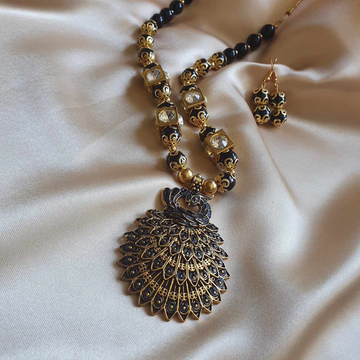 BLACK PEACOCK