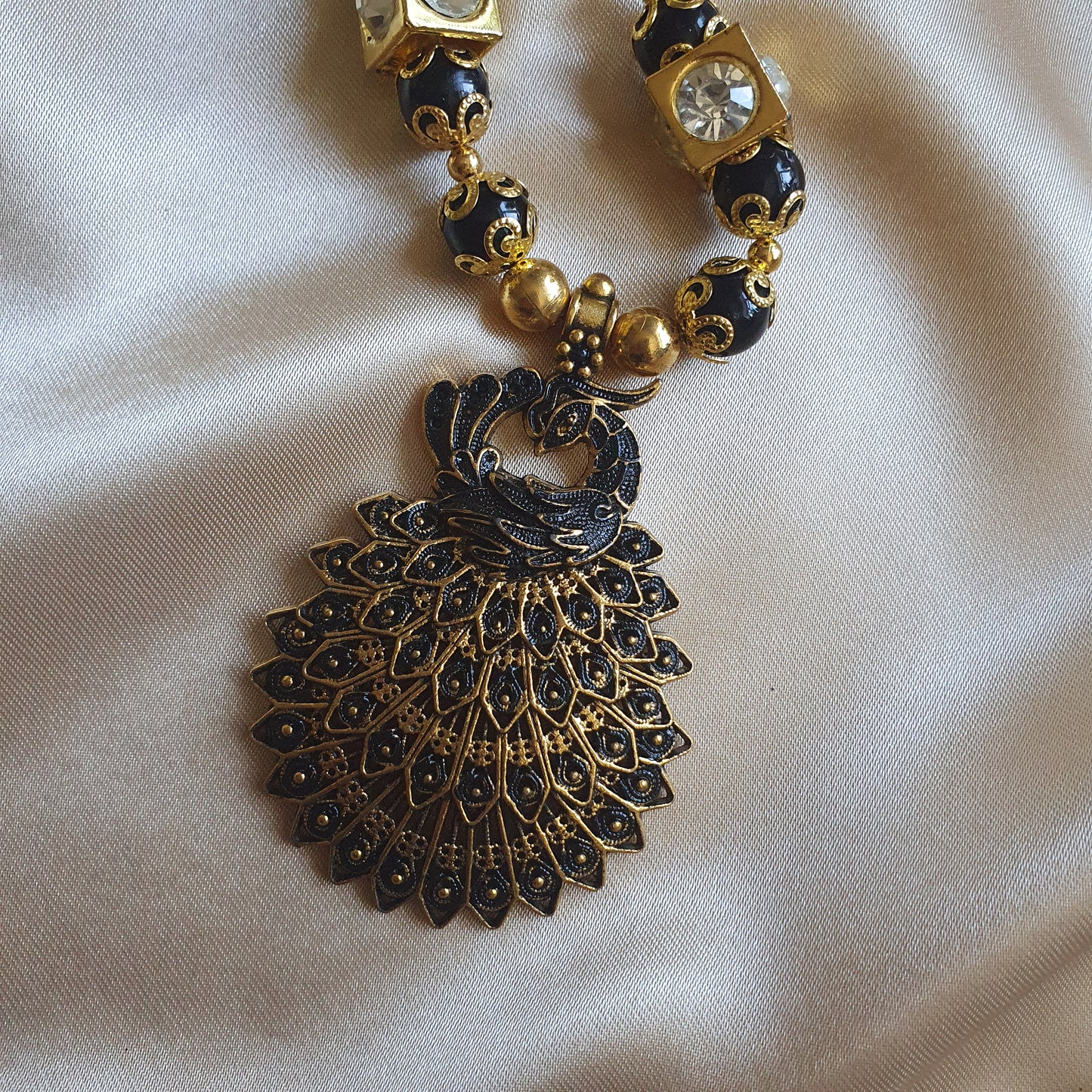 BLACK PEACOCK