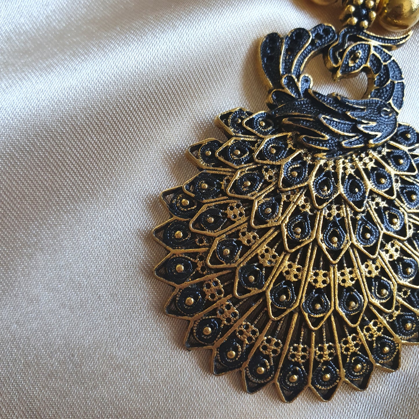 BLACK PEACOCK