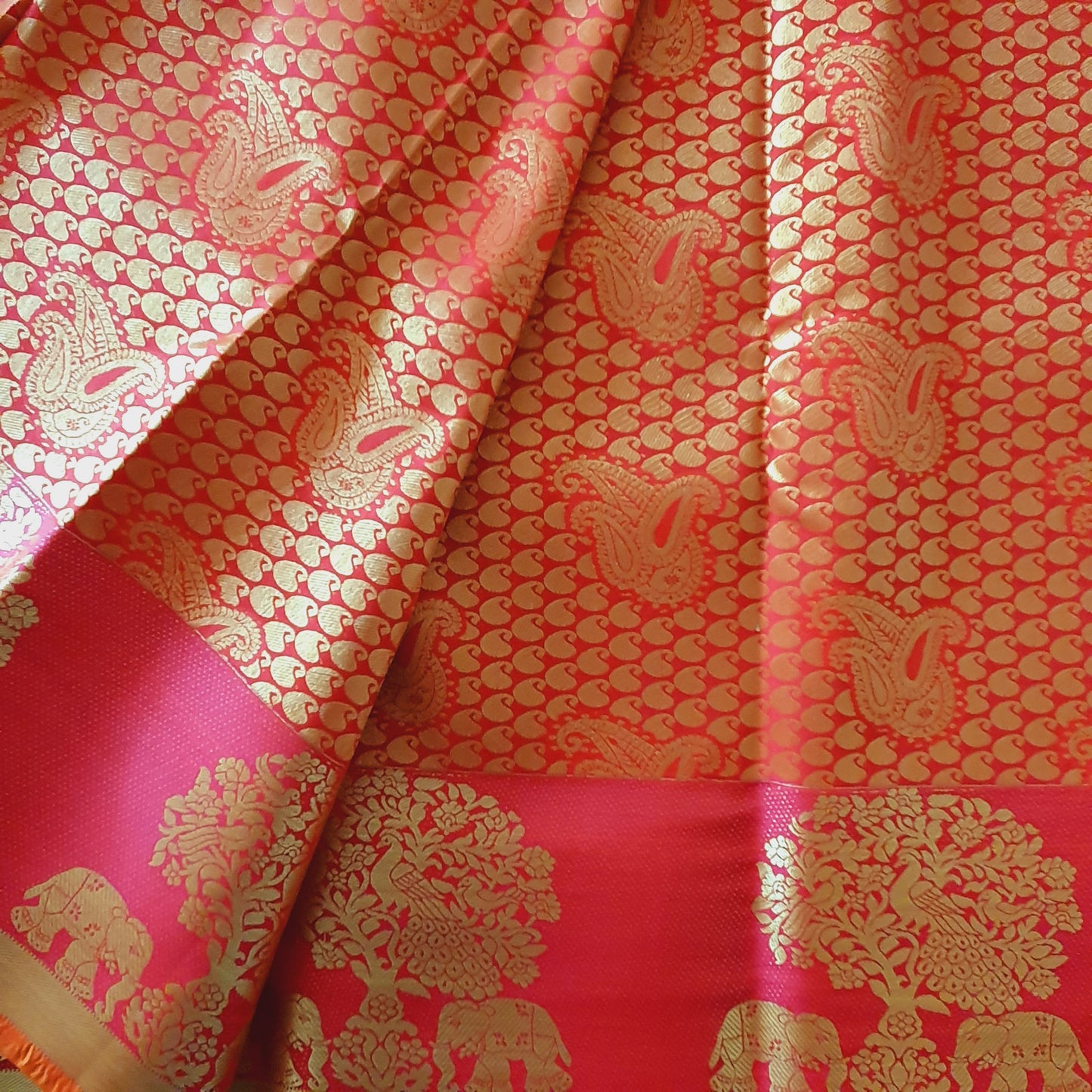 ORANGE RED KANCHIPURAM WITH HEAVY EMBROIDERY