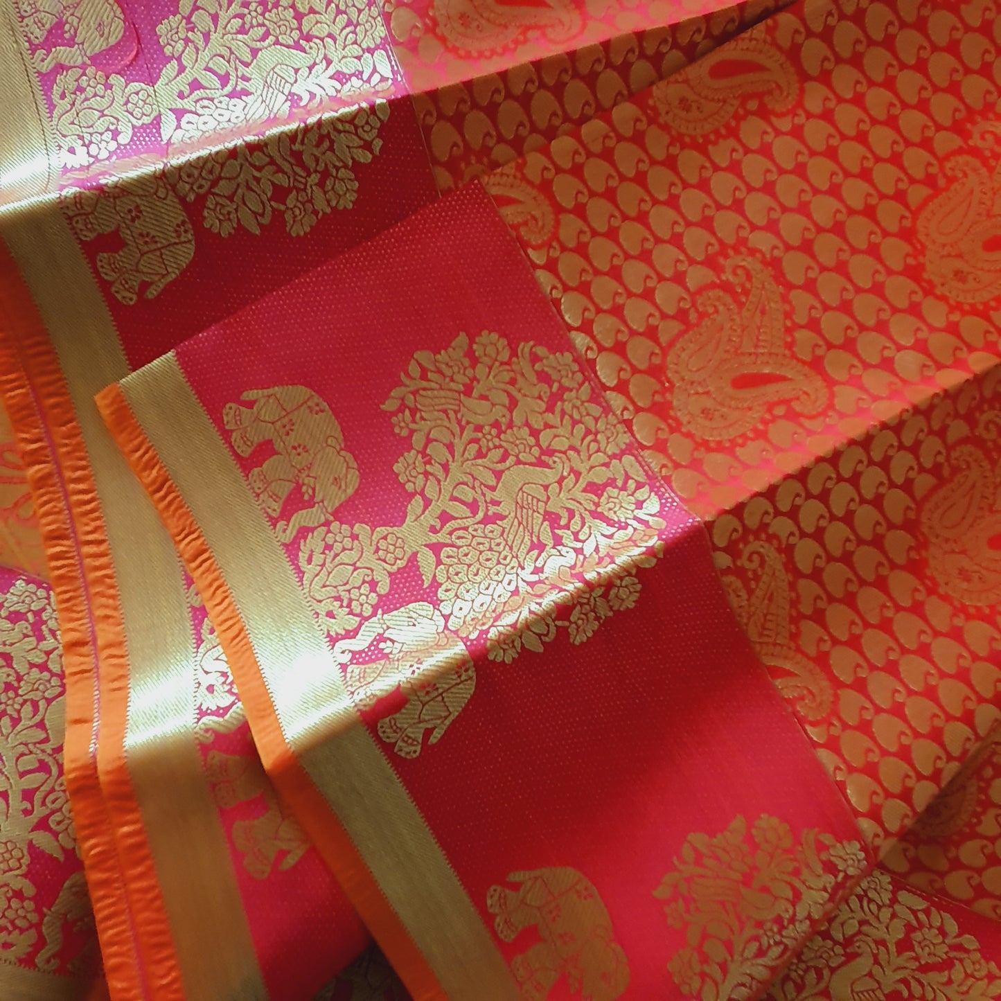 ORANGE RED KANCHIPURAM WITH HEAVY EMBROIDERY