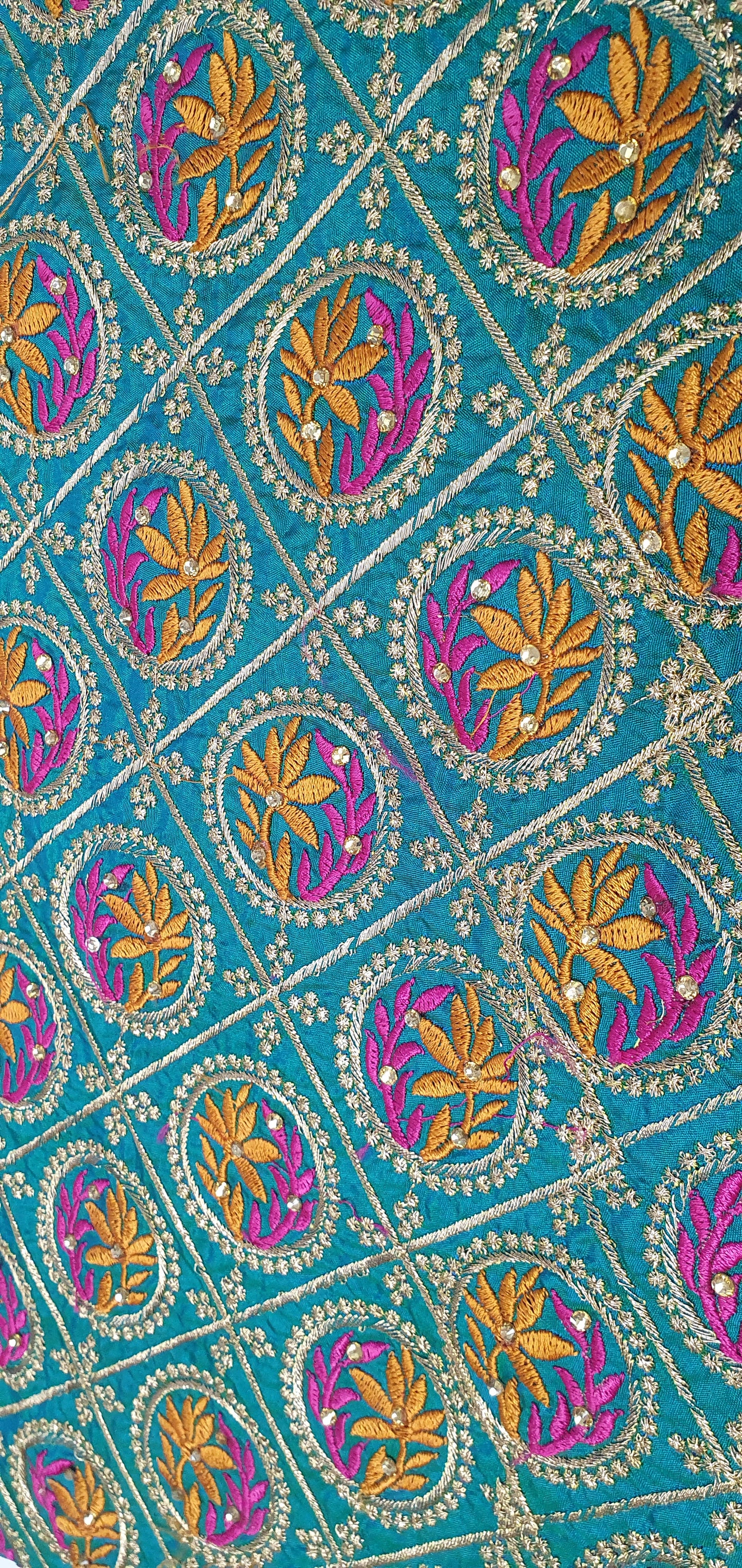 TURQUOISE EMBROIDERED MATERIAL