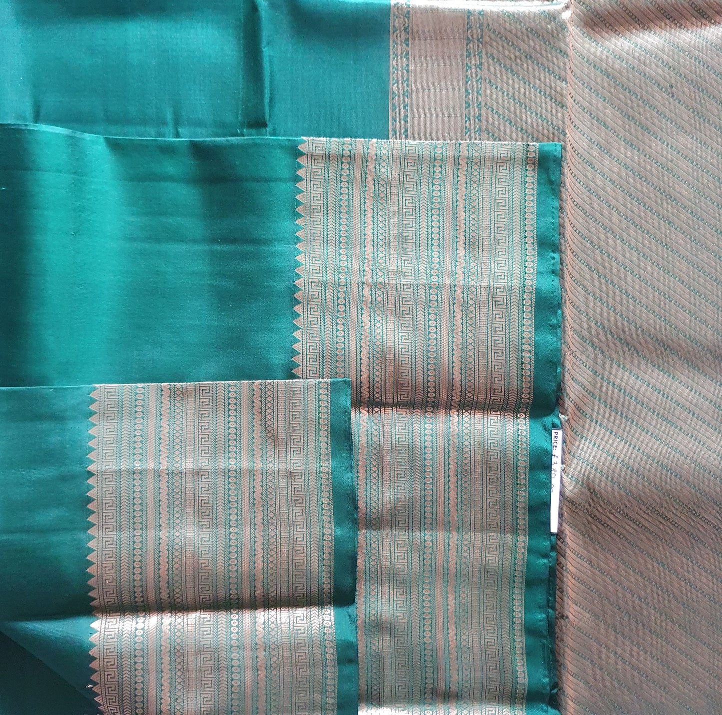 GREEN KANJIPURAM WITH GOLD ZARI BORDER