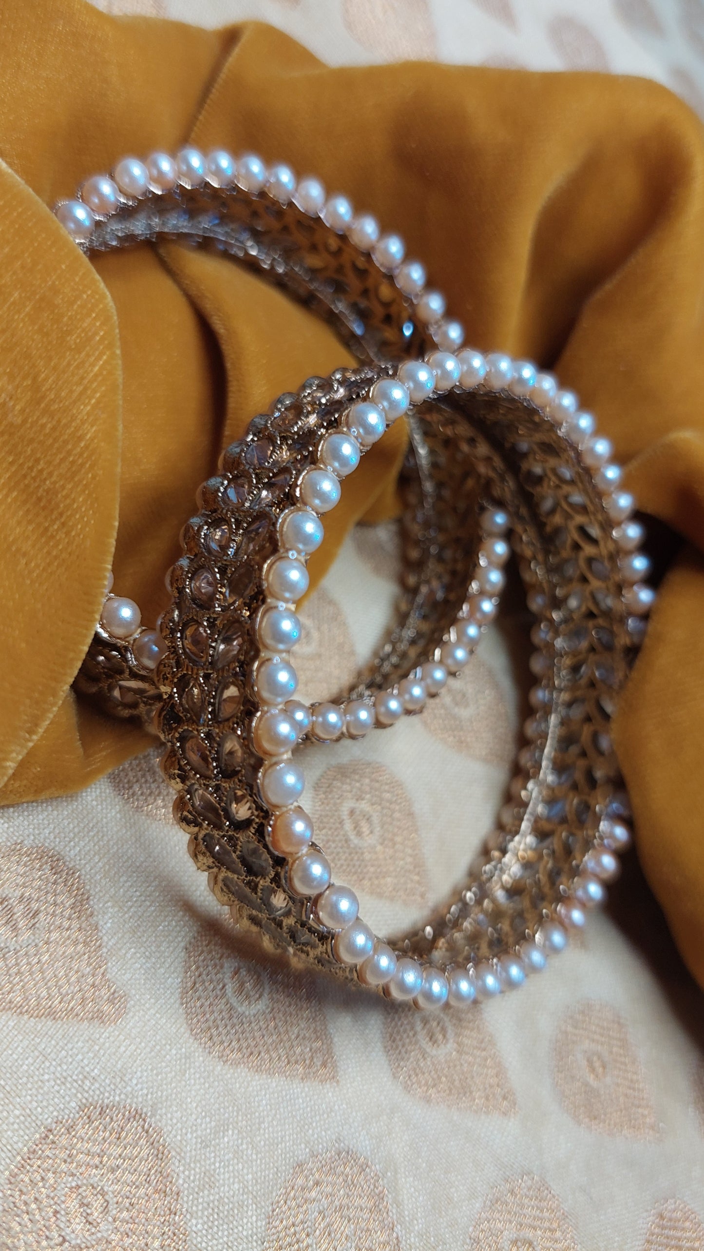 PAIR OF ANTIQUE GOLD BANGLES