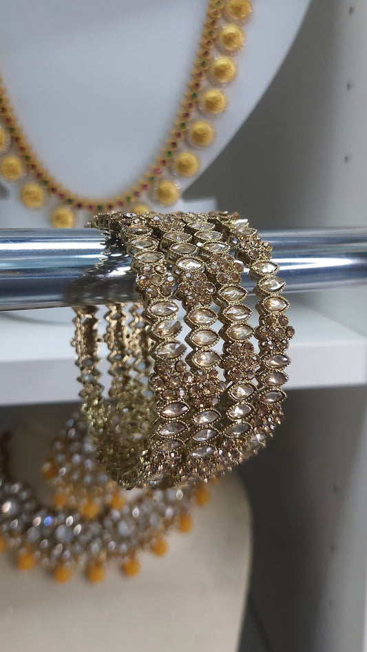 ANTIQUE GOLD BANGLES (4)