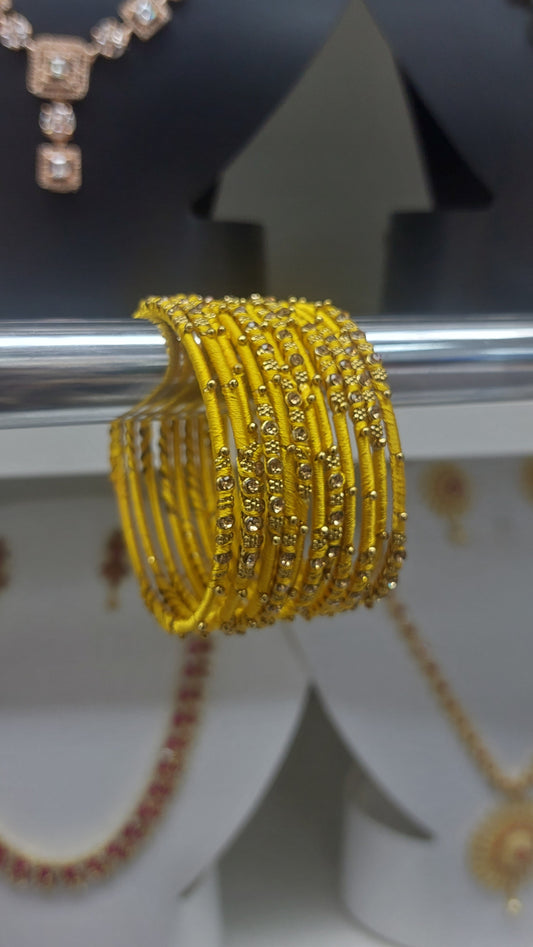 YELLOW THREAD BANGLES