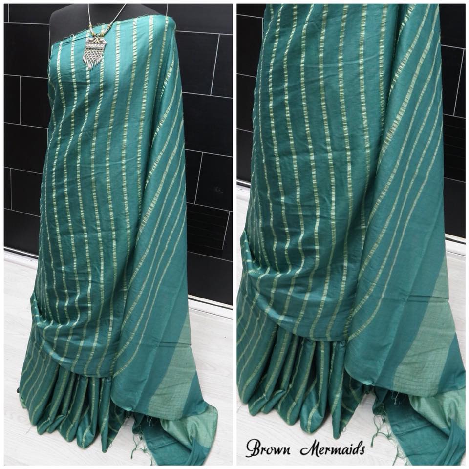 Green linen saree with gold zari lines